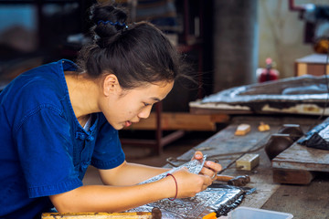 Silverware making. Thai craftman are making silverware. The original of the silver craftsmen on Wua...