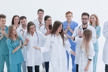 group of confident young doctors stand together