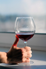 Glass of wine in woman's hand