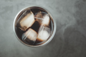 Close up of soft drink in glass with ice