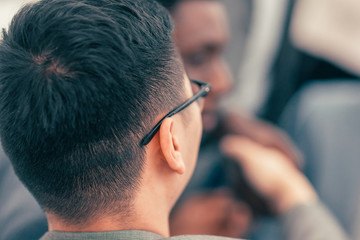 close up. young businessman works in an office.