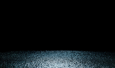  empty space . wet asphalt on a dark background .  a text box below . 