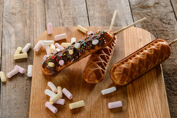 Homemade waffle lollies on a cutting board