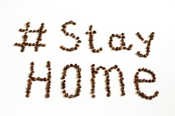 stay home sign with coffee beans on a white background