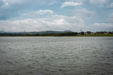 beautiful lake with mountain and amazing sky background