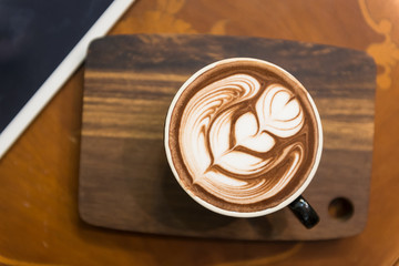 Coffee Latte  in a cup of coffee shop