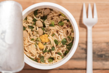 Noodle Cup,noodle soup in a cup,on wooden background