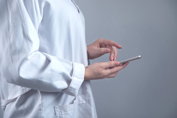 woman doctor hand smart phone