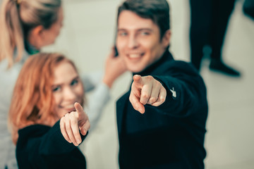 close up. young business people pointing at you