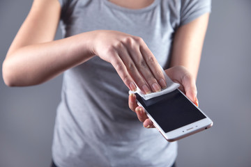 woman hand napkin and phone