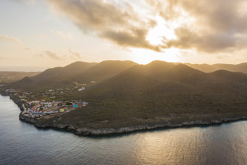 Aerial view of coast of Curacao in the Caribbean Sea with turquoise water, cliff, beach and...