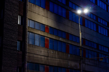 Saratov / Russia. street light on factory windows.