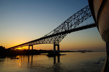 Bridge of the Americas near Panama City during sunrise or twilight, the entrance to the Panama...