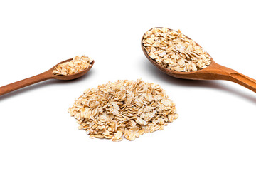 oat flakes and two wooden spoon on a white background