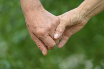Close up portrait of couple holding hands together