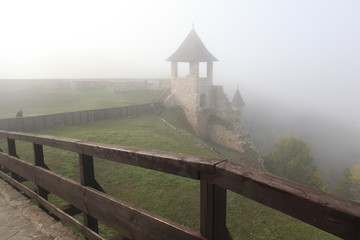 bridge over the river in the fog