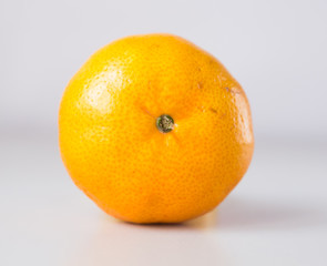 orange tangerines on white background