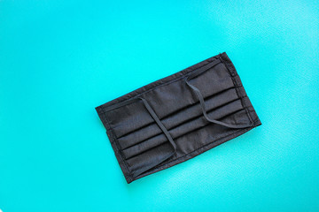 face masks for virus protection, health safety black color. background, top view. copy space for text
