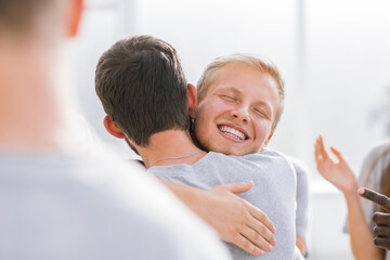 Fototapeta premium close up. happy contestants hugging each other.