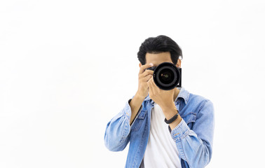 Portrait of a young professional photographer in a modern studio The concept of working as a photographer