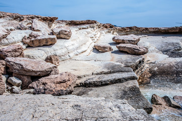 Cape Drepano on the west coast of Cyprus is an amazing natural phenomenon. Sea waves expose a white layered rock that takes on bizarre shapes.   