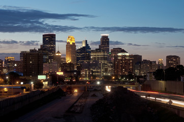 Minneapolis skyline and freeway at night