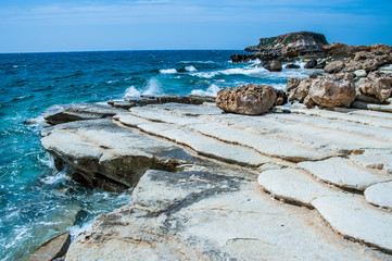 Cape Drepano on the west coast of Cyprus is an amazing natural phenomenon. Sea waves expose a white layered rock that takes on bizarre shapes.   