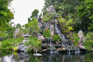 Serene scene of a zen garden with waterfalls in Hue, Vietnam