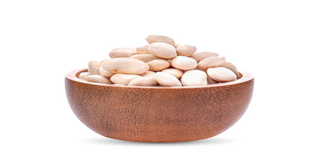 White beans in a wooden bowl on white background.