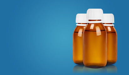 Medical bottle on blue background.
