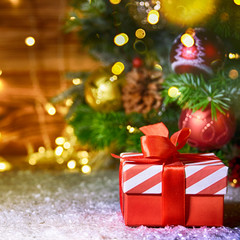 Christmas treewith gifts, rustic background