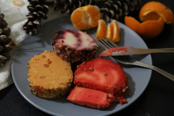 Colored cheese on a plate