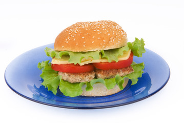 Hamburger with cutlet and vegetables