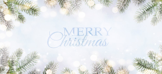 Merry Christmas and Happy New Year, Holidays greeting card with blurred bokeh background