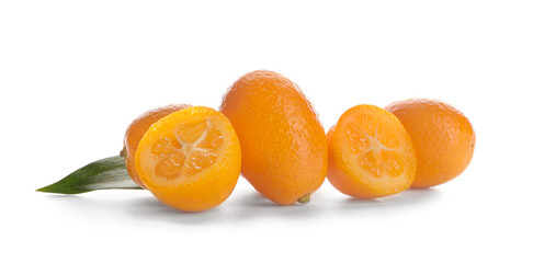 Tasty kumquat fruit on white background