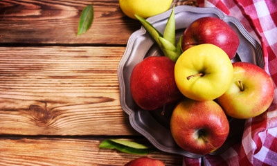 Red apple on the wooden background
