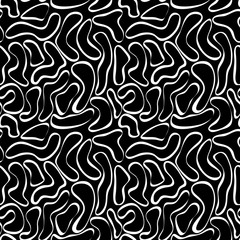 Seamless pattern of white abstract forms of ring ribbons drawn by a brush on black. Modern minimalistic texture. Vector spotted black and white background.