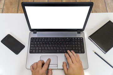 Fototapeta premium Wroking from home concept with hands typing on a laptop