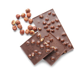 Sweet chocolate with nuts on white background