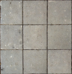 Texture of gray paving slabs, dirty square masonry cover