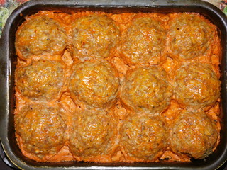 
Minced meatballs with rice baked in the oven with sauce