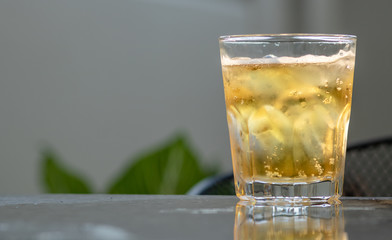 Glass beer on gray background with copy space. and space for text on the right. stay at home.