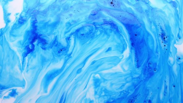 Abstract colorful marble background with milk oil and soap. 