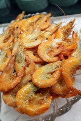 Prawn red fresh raw on ice at buffet