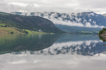 End of fjord. Beautiful Norwegian landscape. view of the fjords. Norway ideal fjord reflection in clear water