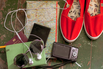 Traveler's accessories, Essential vacation items, Travel concept background. Planning a vacation trip.   Selective focus