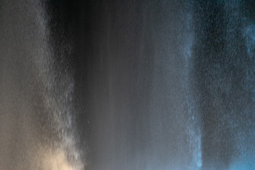 Neon background of light and water splashes