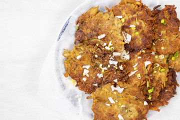 Fried grated potatoes pancakes served on the plate