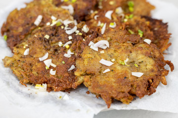 Fried grated potatoes pancakes served on the plate