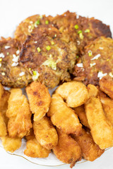 Fried chicken breasts meat with grated potatoes pancakes